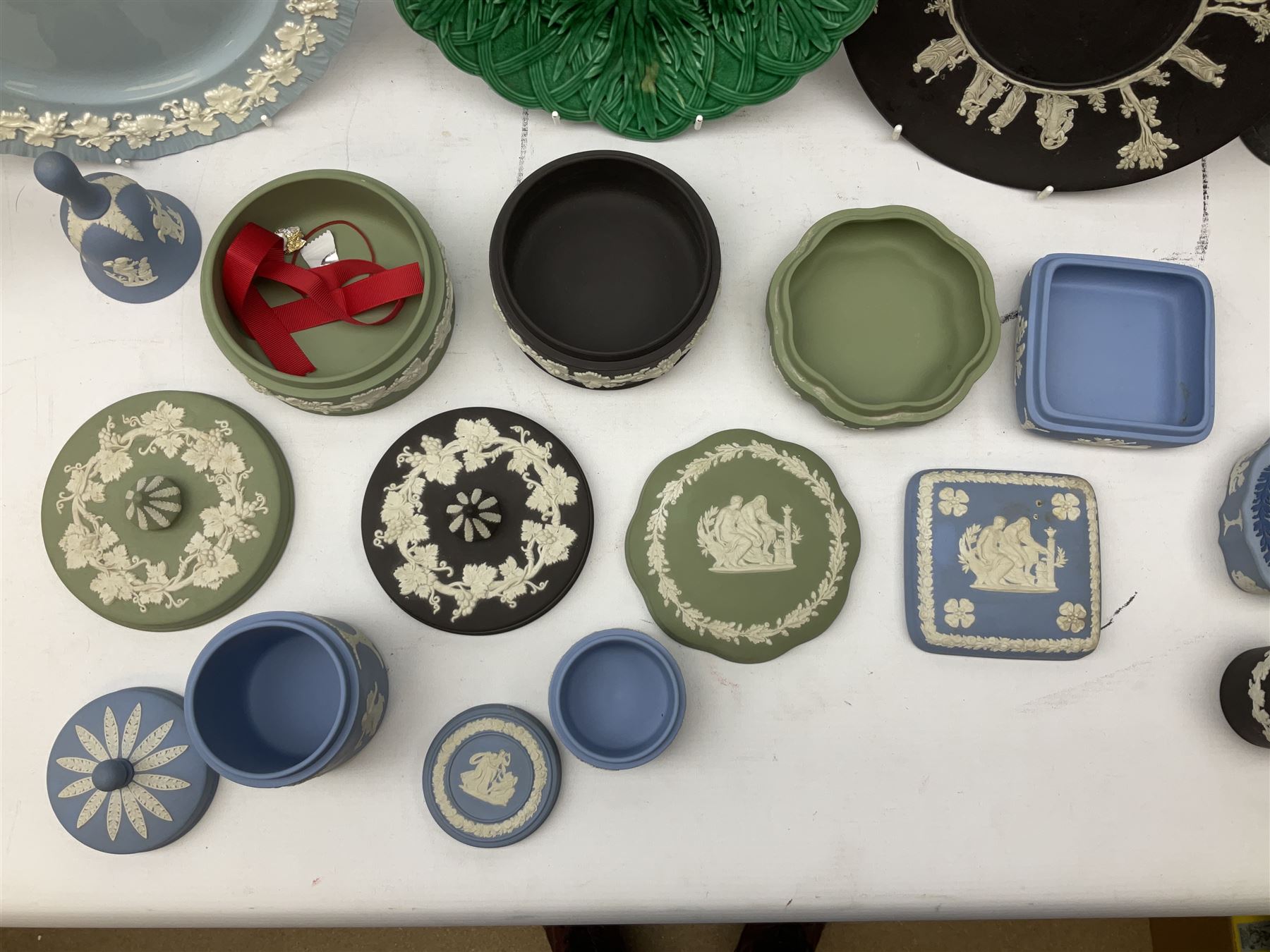 Collection of Wedgwood, to include queensware pattern fluted vase and plate, green majolica leaf dish, Jasperware in blue, green and black, to include covered trinket boxes, vases, plates etc   