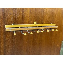 Ashton Leach & Cumberbirch Ltd., Rochdale - early 20th century walnut and mahogany gentleman's wardrobe, arched moulded top with book-matched figured walnut veneers, double doors enclosing fitted interior with hanging rail, tie rack and drawers, raised on cabriole supports