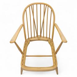 Ercol - Model '203', pair of easy chairs, with blue upholstered cushions and additional orange covers, with looped backrest and shaped spindles, outward swept arms, drop in seat frame