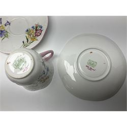 Shelley Wild Flowers pattern part tea service, comprising four cups and saucers, four dessert plates, cake plate, milk jug and open sucrier