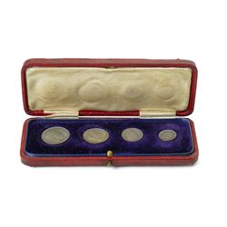 King Edward VII 1905 Maundy Money four coin set, in contemporary red leather case