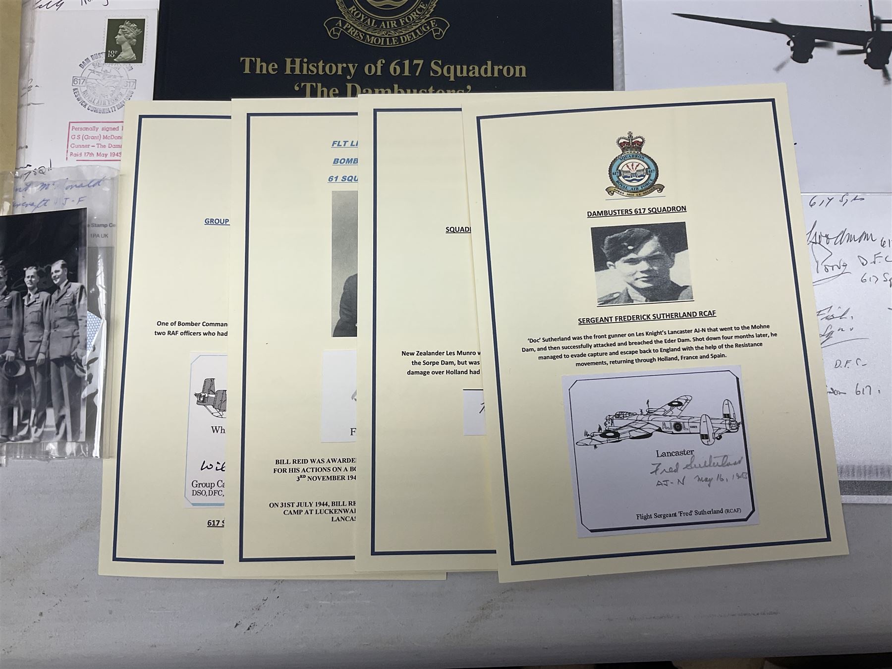 Dambusters 617 Squadron memorabilia - three signed photographs of Lancaster aircraft in flight, group photograph, copy of Vickers-Armstongs letter and drawing from Barnes Wallis, The History of 617 Squadron by Sqn. Ldr. S.J. Hillier, facsimile sets of signatures, FDCs, sheet music, Richard Todd signed photograph and greeting card, etc
