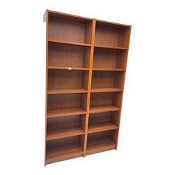 IKEA - pair oak finish open bookcases fitted with five adjustable shelves (60cm x 29cm x 203cm); matching 'Gnedby' tower bookcase (2cm x 17cm x 203cm); and pair 'Billy' corner bookcases fitted with two adjustable shelves (32cm x 28cm x 106cm) (5)