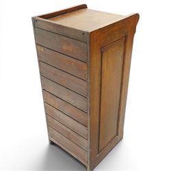 Edwardian oak pedestal filing cabinet, rectangular top with raised three-quarter gallery top, fitted with six drawers with interior paper-stays and brass handles, on plinth base
