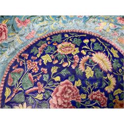 18th/19th century Chinese Canton enamel basin, the circular basin with flat everted rim, decorated with scrolling foliate and fruit decoration on a blue ground, D43cm