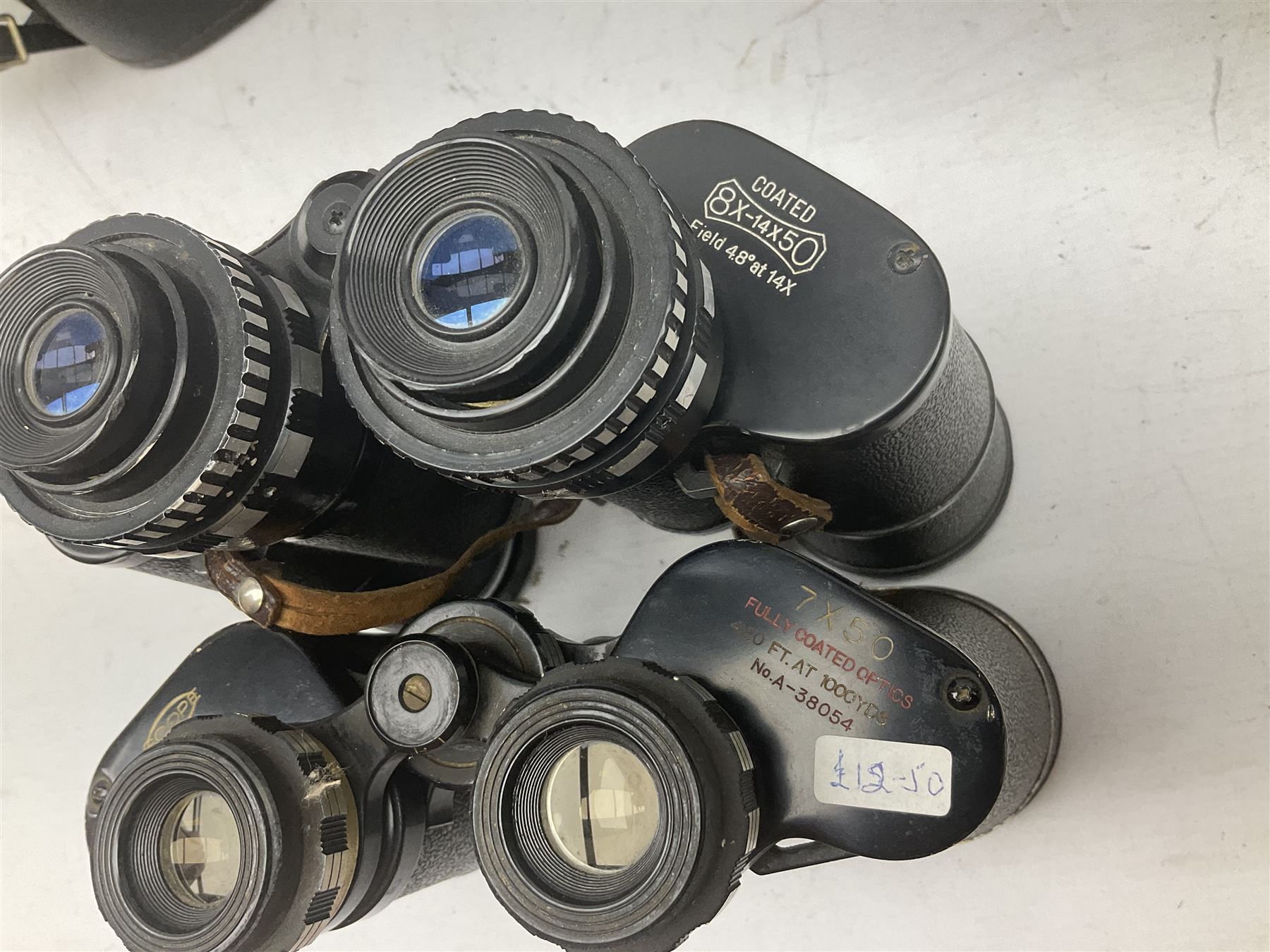 Nine cased pairs of binoculars to include Lieberman & Gortz 12x50, Frank Nipole 8x56, Uniscope, Hoya mark II 8x40, Porst 8x56 etc