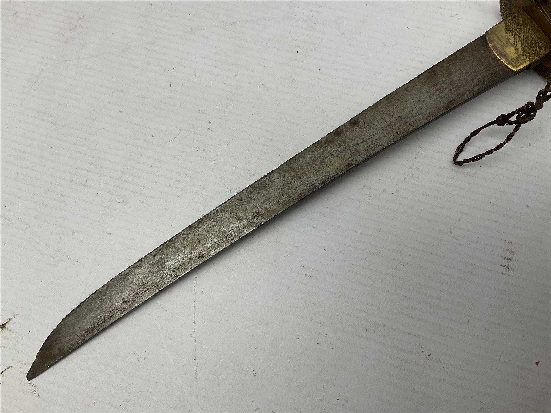 Japanese tanto dagger with 25cm single edged blade, gilded plain punched tsuba, cord bound ray skin grip incorporating menuki and ornate gilded metal mounts L39cm overall