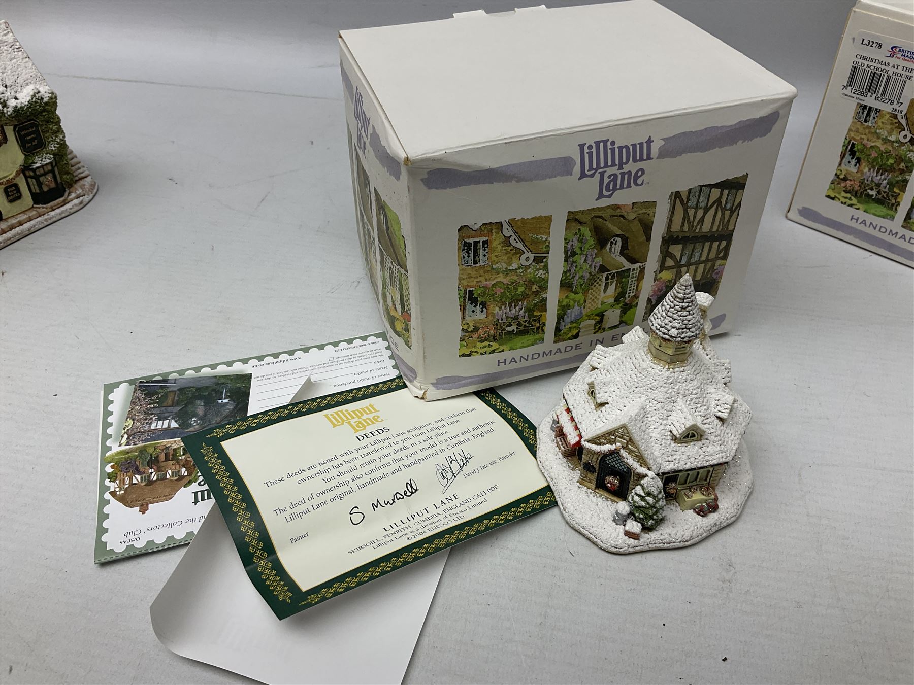 Five Lilliput Lane Illuminated Cottages, comprising Christmas is Coming, with box and deed, Christmas at Mol's, with box and deed, Christmas in Canterbury, with box and deed, Christmas Lights at Sweet Delights and The Three Kings, with box and deeds, together with twelve other Lilliput lanes, to include The First Noel, with box and deed, Winters Moonlight, Yuletide treats, with box and deed etc (17)