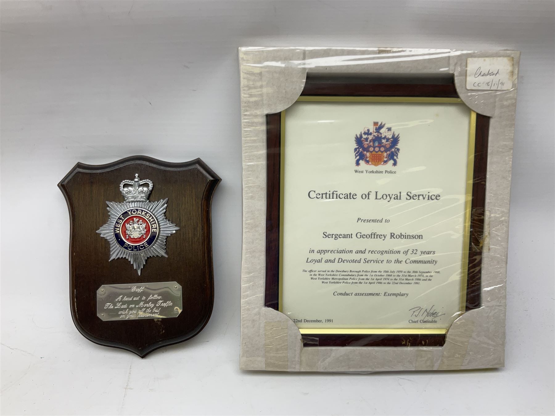 Archive of memorabilia and ephemera relating to Pc. (later Sgt.) Geoffrey Robinson of Dewsbury (later West Yorkshire) police force including cased Long Service and Good Conduct Medal; helmet plates and cap badges, collar numbers and uniform buttons, whistles, certificates, photographs, plaque etc 1960s - 1990s