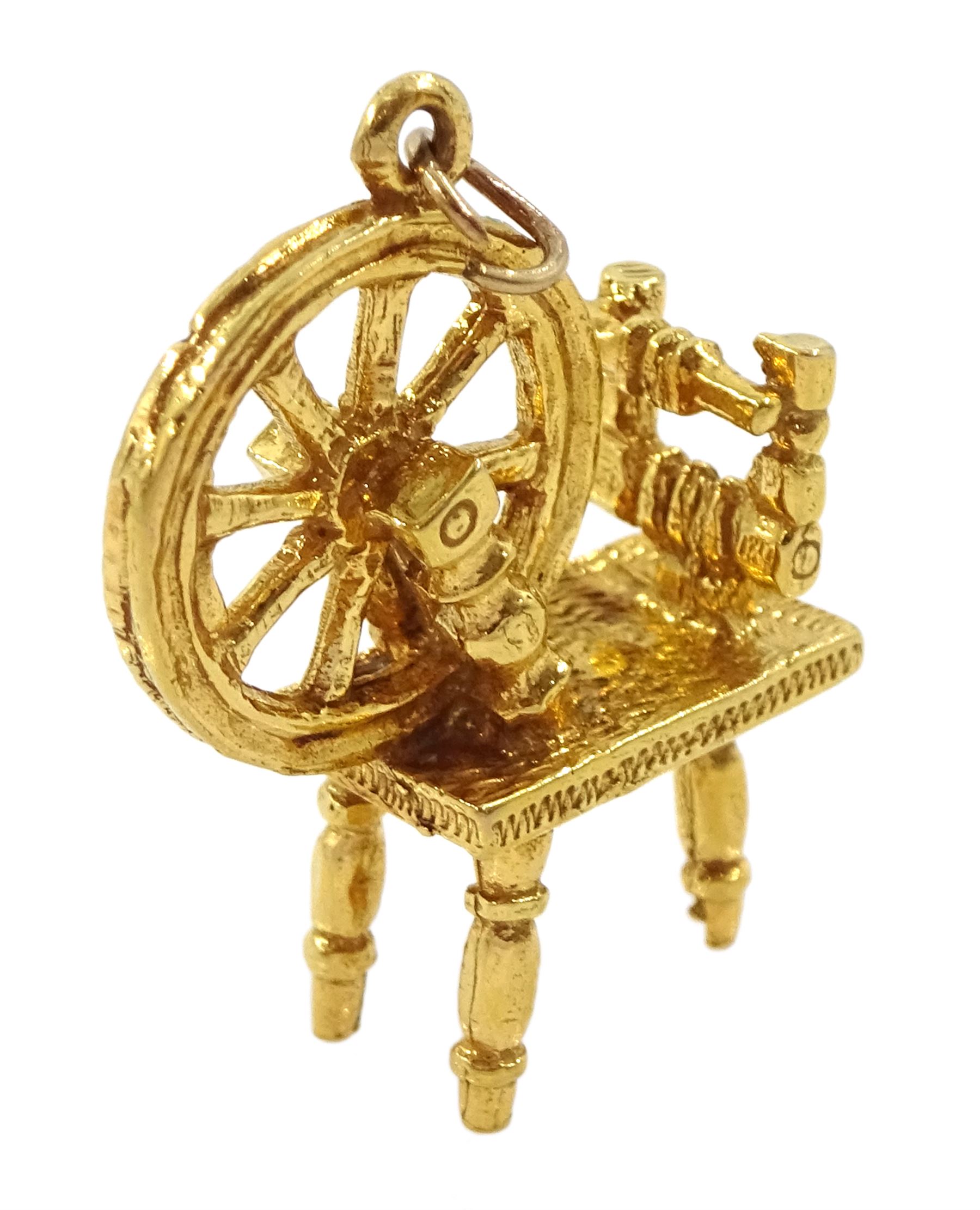 9ct gold spinning wheel pendant / charm, hallmarked