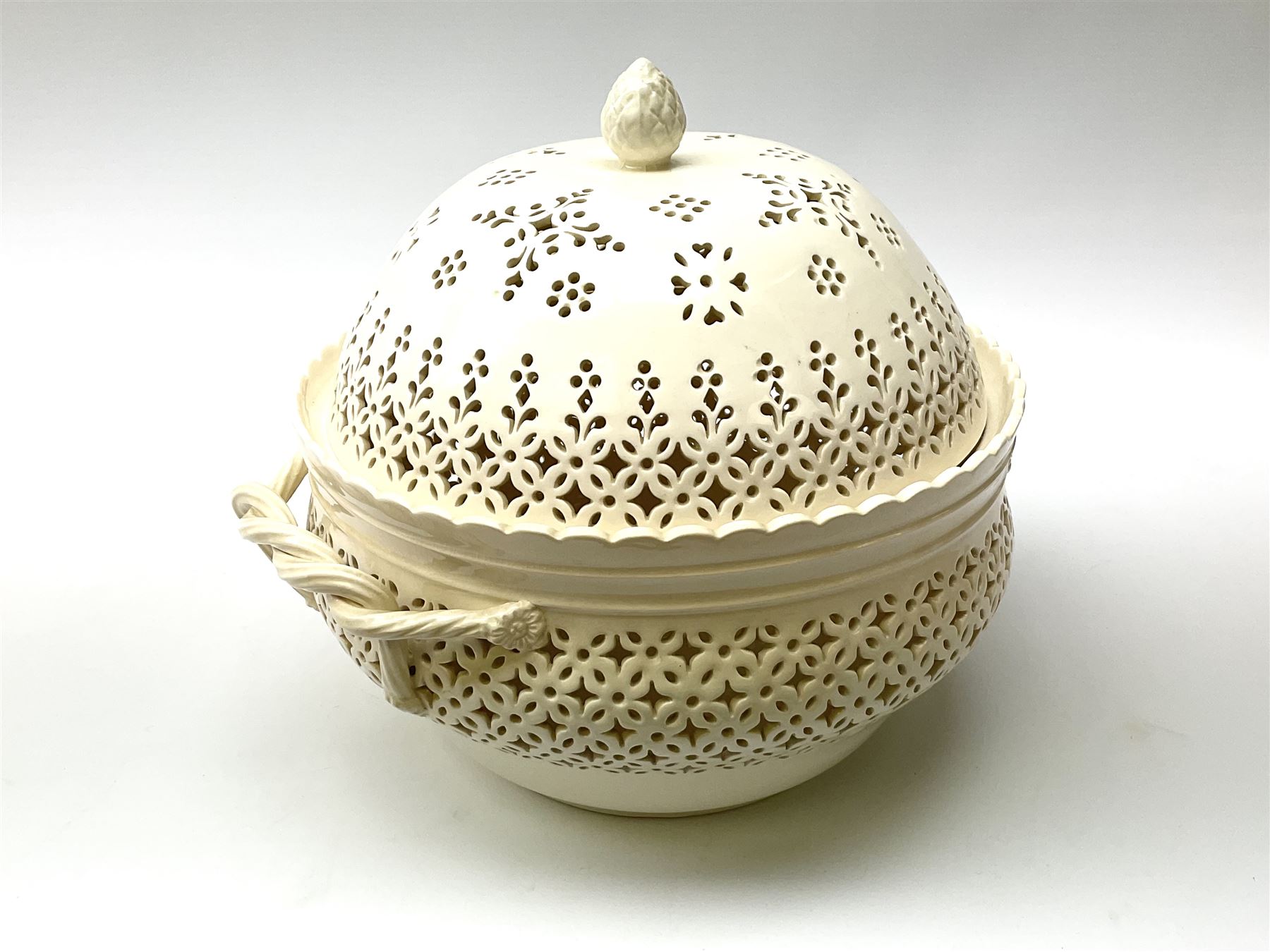 Large 20th century Leeds pottery basket and cover, of bulbous form with pierced detail and twin rope handle, with impressed mark beneath, H23cm D25cm