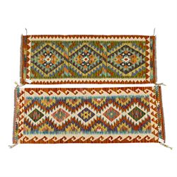 Two Chobi flatweave kilim runners with a repeating stepped diamond medallion design in liv...
