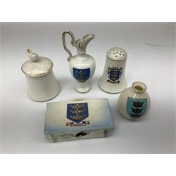 Fourteen items of Hull crested china by W.H. Goss etc including  Boer War, De La Pole and Wilberforce monuments, 3-piece cruet on trefoil stand, various vases and jugs etc  