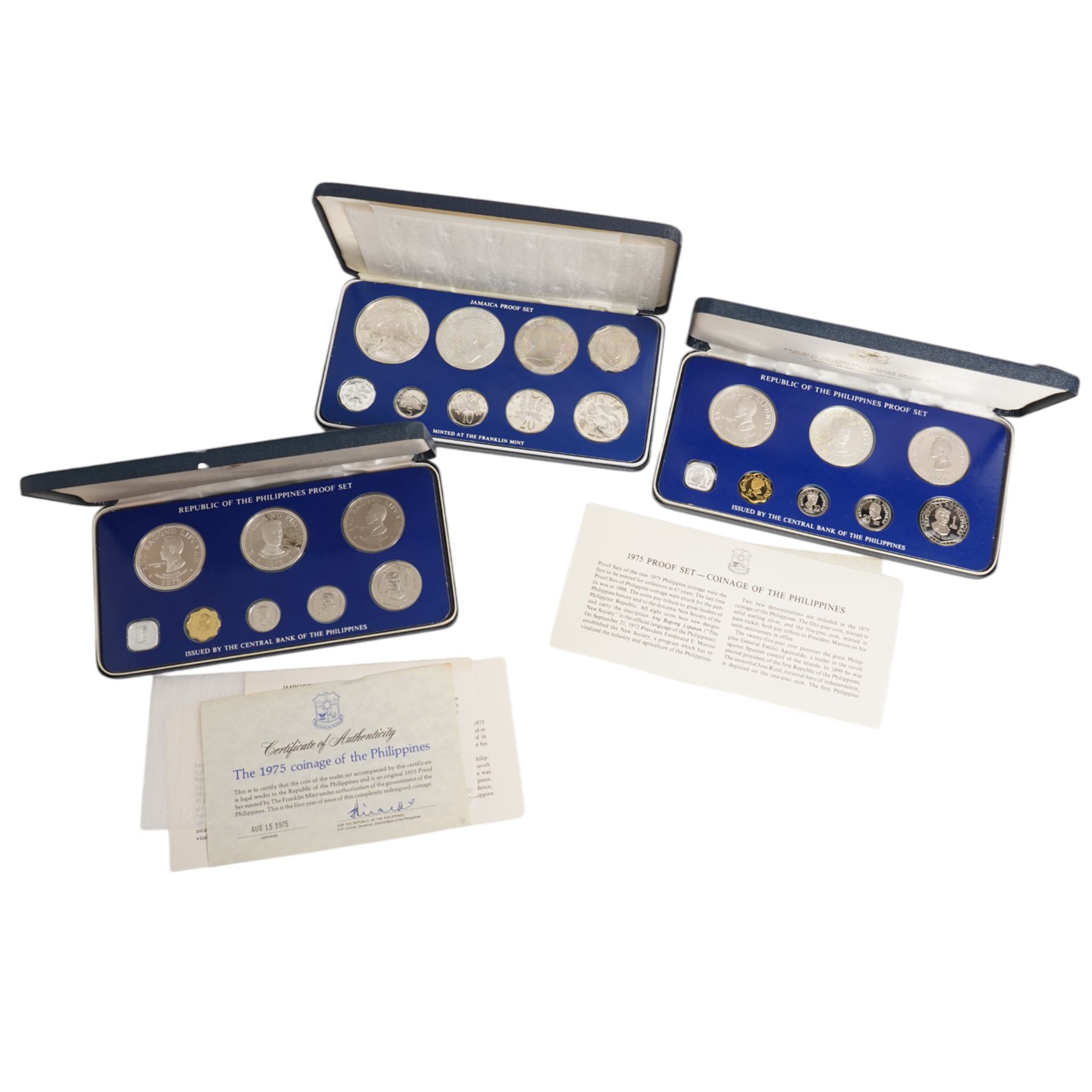 Twelve international proof coin sets, all produced by The Franklin Mint and containing high denomination silver coins, comprising two Republic of the Philippines 1975 proof eight coin sets, two Commonwealth of the Bahamas proof nine coin sets, 1973 and 1976, Guyana 1976 proof eight coin set, Jamaica 1976 proof nine coin set, Papua New Guinea 1976 proof eight coin set, First National Coinage of Barbados 1973 proof eight coin set, Ethiopia 1977 proof five coin set, Republic of Seychelles 1976 proof eight coin set, British Virgin Islands 1977 Royal Silver Jubilee proof six coin set, First Official Coinage of the British Virgin Islands 1973 proof six coin set; together with Pobjoy Mint Isle of Man 1977 silver proof seven coin set, 'Commemoration of the 1100th Anniversary of the Settlement of Iceland' 1974 proof two coin set, The Royal Mint United Kingdom 1977 Silver Jubilee silver proof crown coin, and other international proof sets