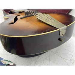 1950s Framus arch top acoustic guitar with sunburst finish and Framus logo to top, No.1937 L104cm; in hard carry case.