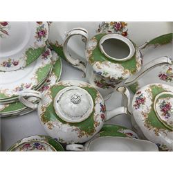 Paragon Rockingham pattern part tea and dinner service including three teapots, milk jug, cups and saucers of various sizes, ten soup bowls, ten side plates, ten dinner plates etc (96)