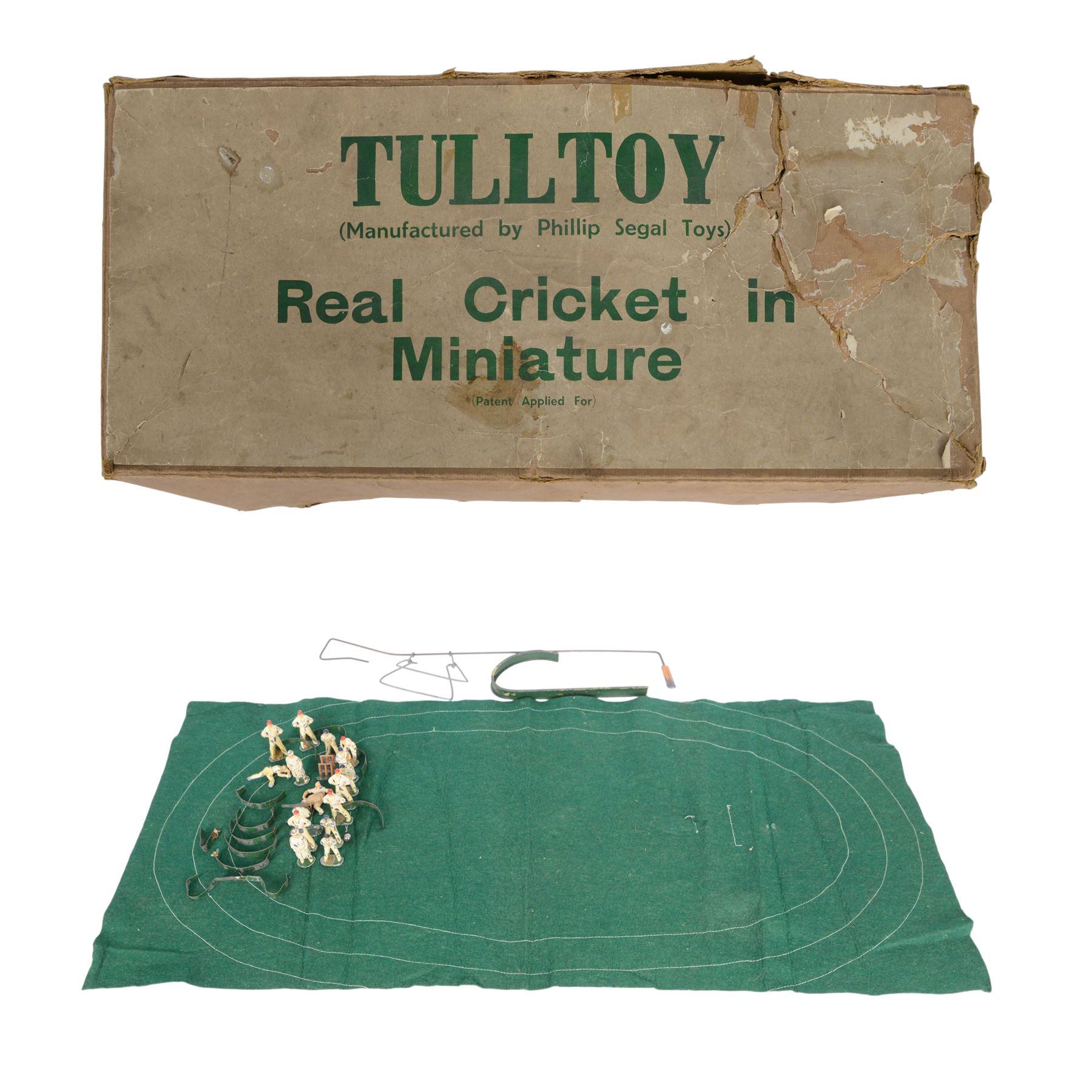 1940s Tulltoy by Phillip Segal Toys 'Real Cricket in Miniature' circa 1947, includes thirteen lead cricketers, six with red hats and seven with blue, two umpires, two sets of wickets, one metal ball, felt cricket pitch with white stitching and metal batting and bowling fixtures, contained within original box