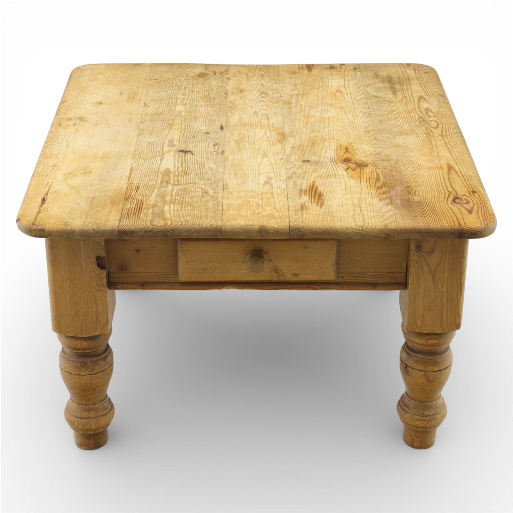 20th century stripped pine coffee table, square top over two frieze drawers, raised on block and turned supports