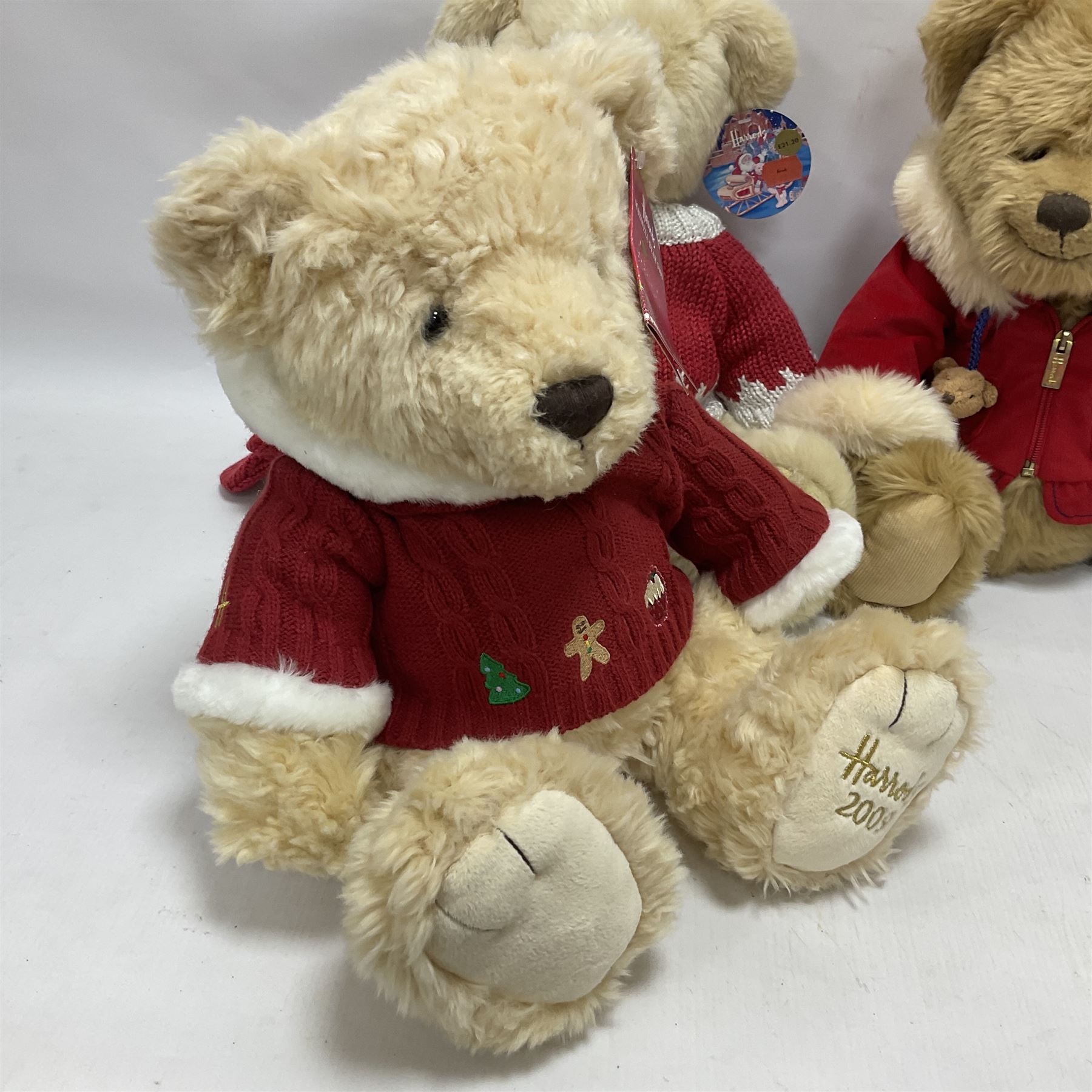 Six Harrods annual teddy bears, dating between 2005 and 2010, including 20th anniversary edition bear, tallest H39cm