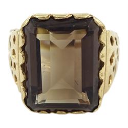 9ct gold single stone emerald cut smoky quartz ring, with pierced design shoulders, hallmarked 