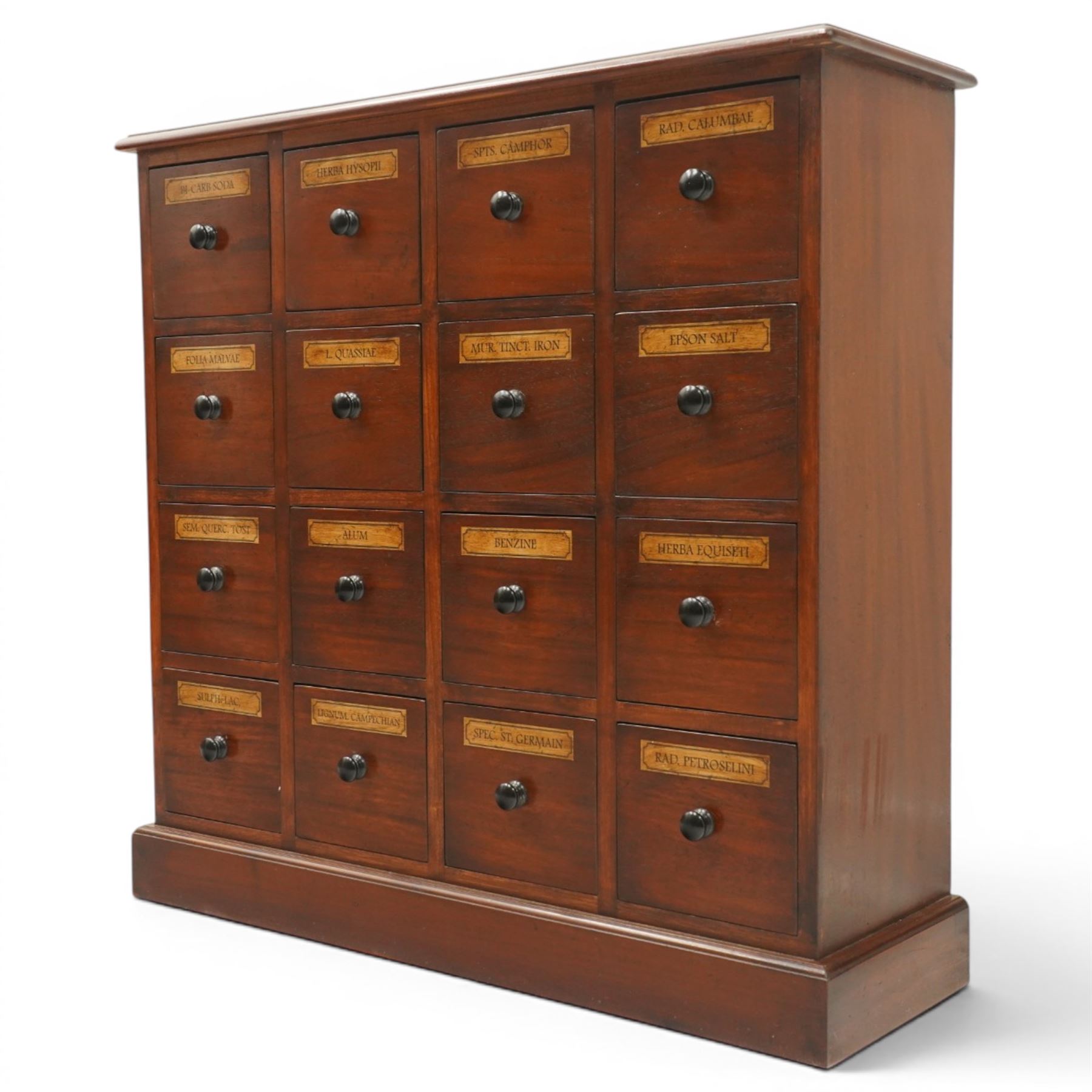 Victorian style mahogany stained chemist’s cabinet, rectangular moulded top over sixteen small drawers, each fitted with turned knob handle and applied gilt paper pharmaceutical labels, on moulded plinth base