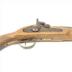 Indian ornamental percussion cap muzzle loading musket with walnut stock, chequered pistol grip, brass fittings and under barrel ramrod L112cm overall