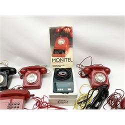 Collection of vintage telephones, including dial and button phones, together with a Monitel telephone charge clock and additional black handset. 
