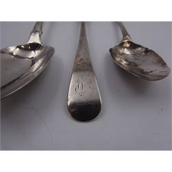 George III Newcastle silver Old English pattern table spoon, hallmarked Thomas Watson, Newcastle 1802, together with a George IV silver fiddle pattern table spoon, engraved with monogram, hallmarked Phillip Phillips, London 1828 and a silver Hanoverian pattern dessert spoon