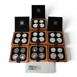 Seven Royal Canadian Mint 1976 'Montreal Olympics' silver proof four coin sets, each conta...