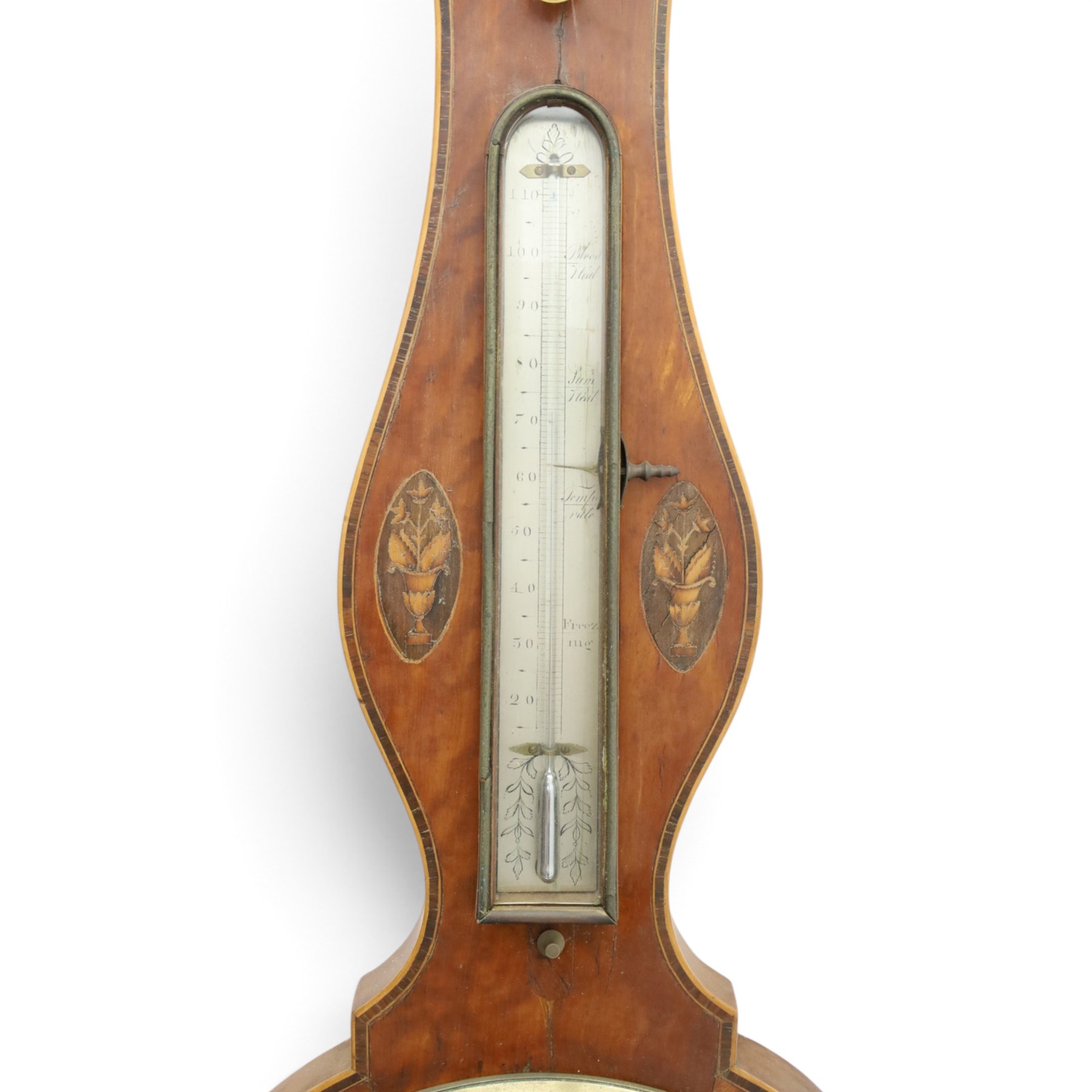 Three mahogany wheel barometers, each with silvered dial, thermometer and hygrometer, two with inlaid decoration, one with architectural pediment and one with swan-neck pediment 