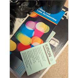 Contax SLR camera with a Yashica ML Zoom 42-75mm 1:3.5-4.5 lens, in case with accessories, together with a Yashica FX-D Quartz SLR camera with a Carl Zeiss Planar 1.7/50 lens, with filters, instruction booklets and other accessories