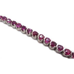  14ct white gold (tested) forty-four round ruby line bracelet   
