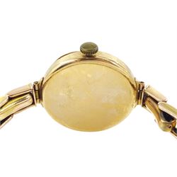 Omega early 20th century 9ct gold manual wind wristwatch, silvered dial with Arabic hour markers and subsidiary seconds dial, London import mark 1921, on expanding gold bracelet, stamped 9ct, boxed