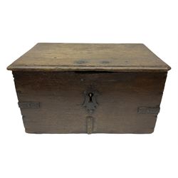 18th century oak iron bound box, with stylised fleur-de-lis escutcheon and hinged lid, lacking key, H25cm W46cm D29cm