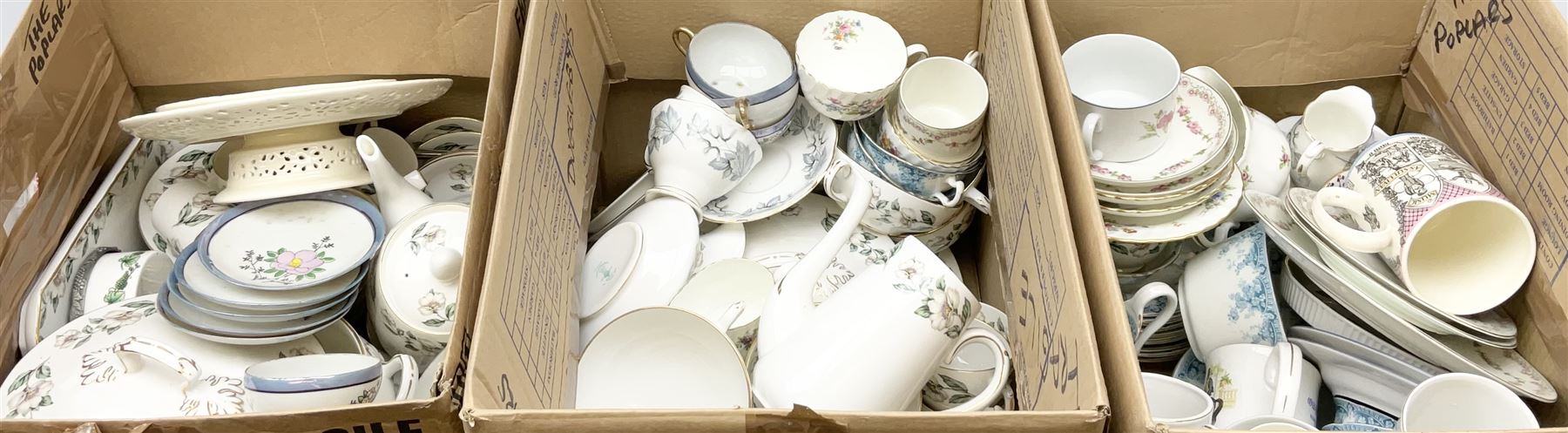 Collection of tea and dinner wares, including an extensive set of 'Christmas Rose' Crown Staffordshire, including tea and coffee wares and two lidded tureens, a blue and white decorated set of cups and saucers, cake stand etc, three boxes . 