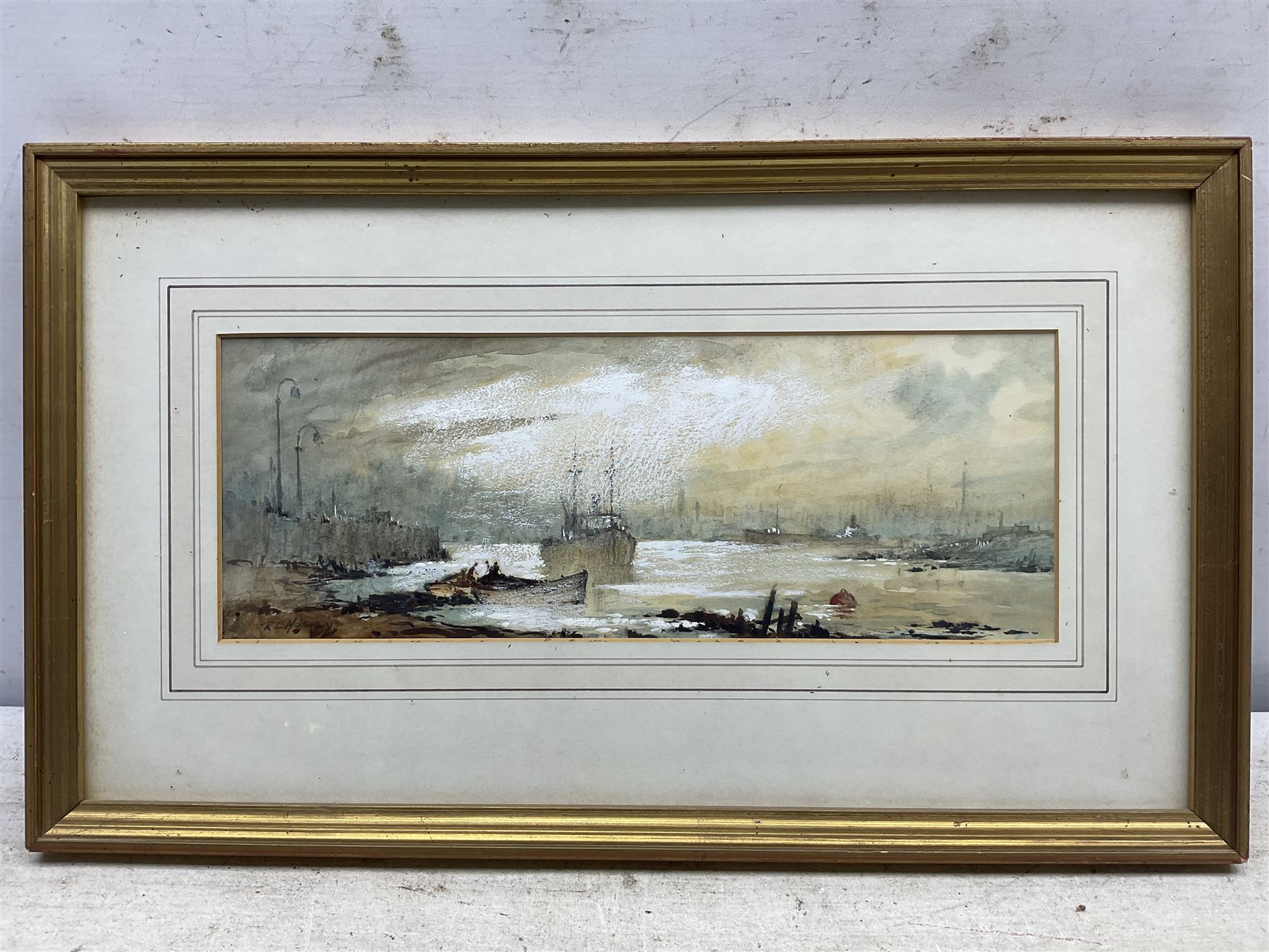 Robert Leslie Howey (British 1900-1981): Shipping in the Estuary, watercolour heightened with white signed 12cm x 33cm 