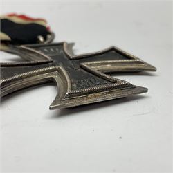 WWI Imperial German Iron Cross 2nd Class, the suspension ring indistinctly stamped M8?; with WWII ribbon