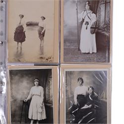 Five-hundred and thirty one late 19th and early 20th century real photographic postcards produced by J.T.Ross, depicting  daily life, village scenes, landmarks and street views of Whitby, the surrounding villages and South Teeside, including fifty-two modern copies, all housed within three postcard albums and accompanied by four copies of Ross, Photographer, Whitby 'The Life and Work of a Yorkshire Artist' by Colin Bullamore which provides a detailed overview of his life and work