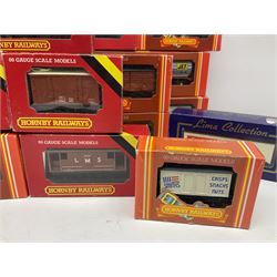 Hornby '00' gauge - twenty goods wagons including freightliners with containers, 100 ton Tankers, Car Transporter with cars, Hopper Wagons, Closed Vans etc; together with another two by Lima and Dapol; all boxed (22)