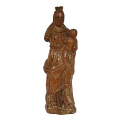 17th century carved limewood figure of a saint, with traces of original gilding, H22.5cm
