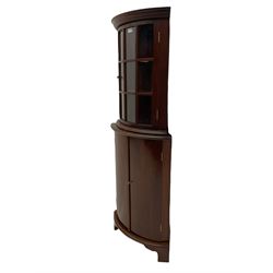 Late 20th century mahogany floor standing (W55cm, H82cm), and wall hanging (W51cm, H66cm) corner cabinets, both bowed, the wall hanging cabinet with glazed door, the floor standing cabinet on bracket feet, can be combined into one 