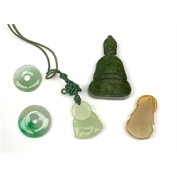 A jade pendant modelled as a hotai, H3.5cm, two small jade pi discs, a further carved pendant modelled as a buddah, and a carved soapsone figure of similar form. 