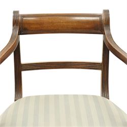 Georgian mahogany reeded carver armchair or elbow chair, bar back and scrolled arm terminals above over-stuffed seat, raised on sabre supports