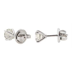 Pair of 18ct white gold round brilliant cut diamond stud earrings, stamped 750, total diamond weight approx 1.40 carat