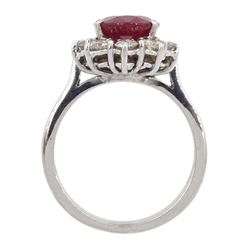 18ct white gold oval Thai ruby and round brilliant cut diamond cluster ring, hallmarked, ruby approx 3.10 carat, total diamond weight approx 0.95 carat