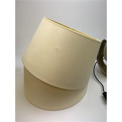 A pair of contemporary brushed table lamps, of curved form, with cream shade, lamps overall H46.5cm. 