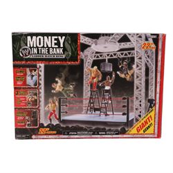 Jakks Pacific wrestling ring and wrestlers, including WWE Money in the Bank Ladder Match Wrestling Ring, boxed, six carded Ruthless Aggression Series 27 wrestlers John Cena, Chris Masters, Mr Kennedy, Bobby Lashley, Carlito and Batista and seven loose wrestling figures