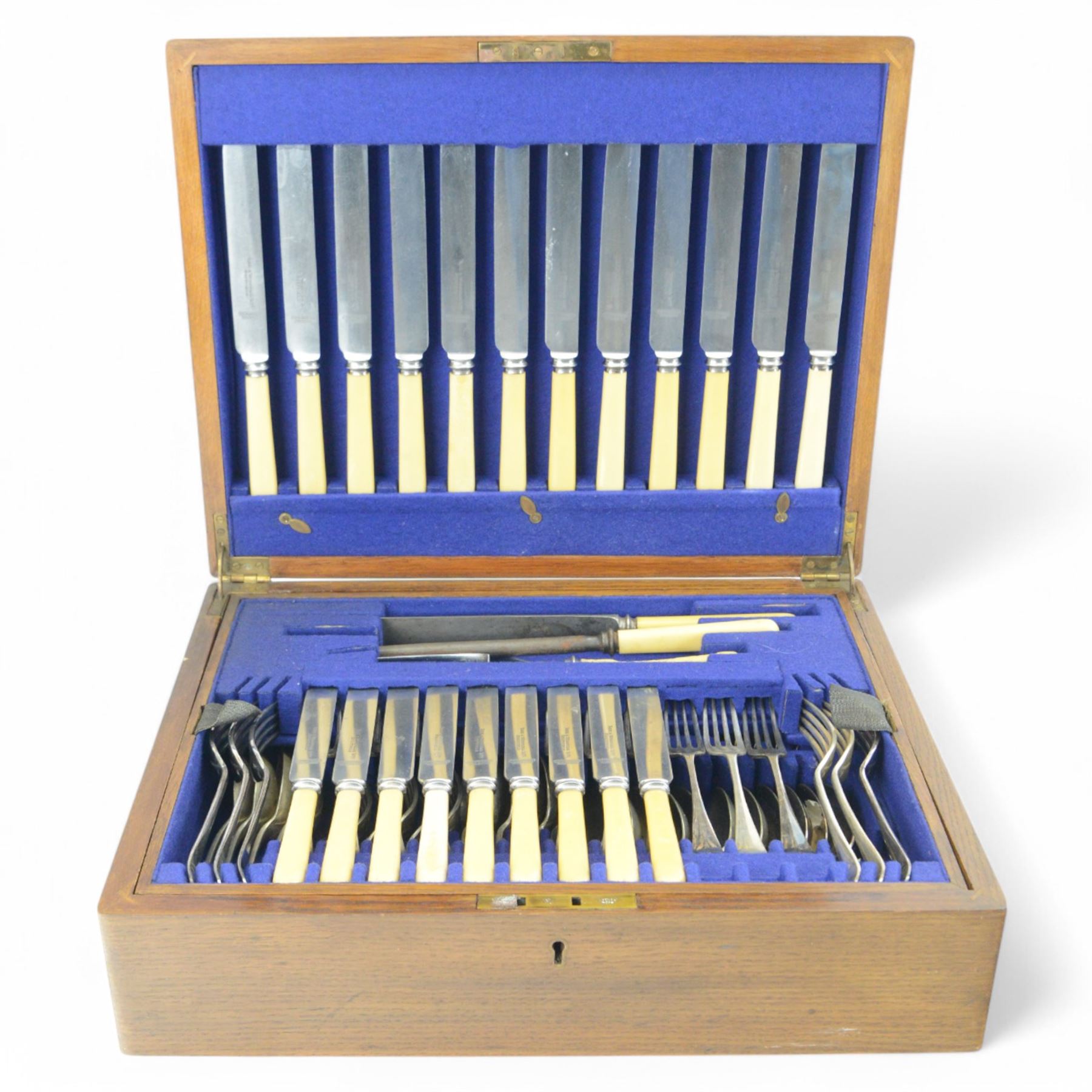 1930s part canteen of stainless steel cutlery with ivorine handles, contained within a wooden box with presentation engraving to cover