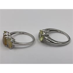 Seven 9ct white gold stone set rings, including three stone opal ring and oval green stone solitaire ring, all hallmarked 
