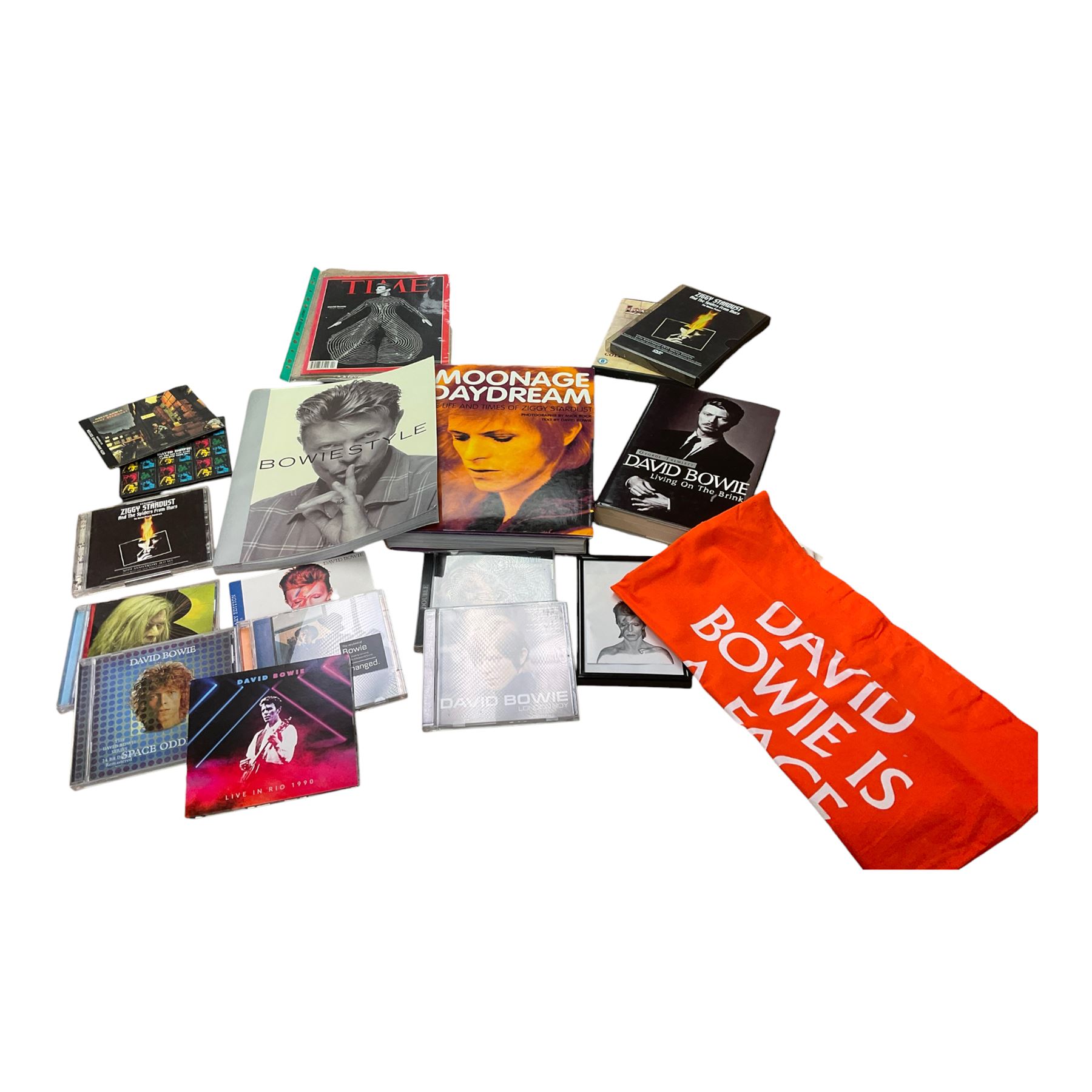 Collection of David Bowie memorabilia, including Time Magazine, Tote bags, CDs, books etc  